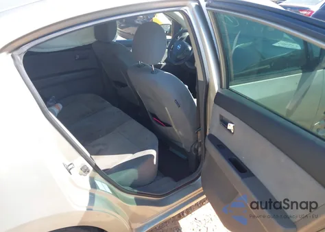 2009 Nissan Sentra 2.0S from USA, damaged, VIN 3N1AB61E29L628088